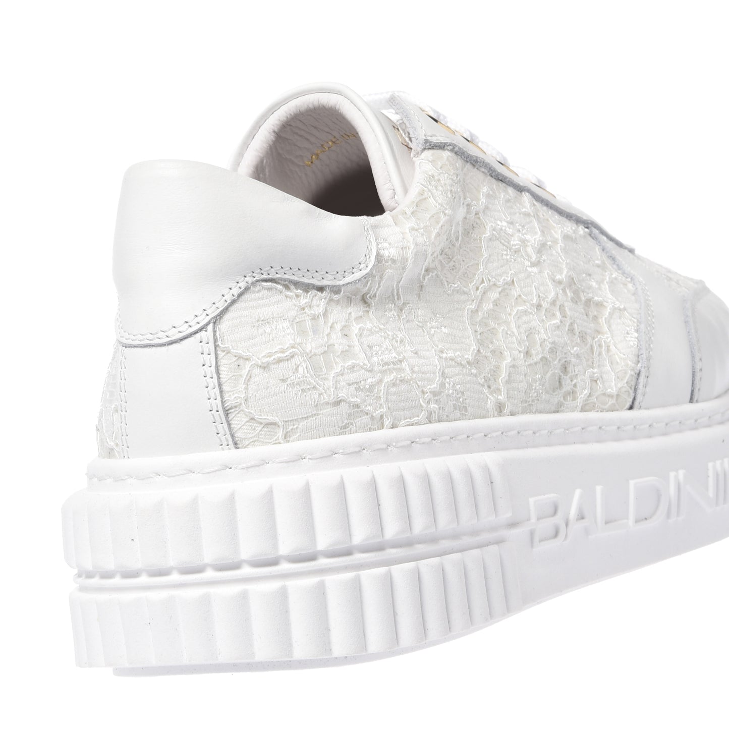 Sneaker en cuir et dentelle blanche