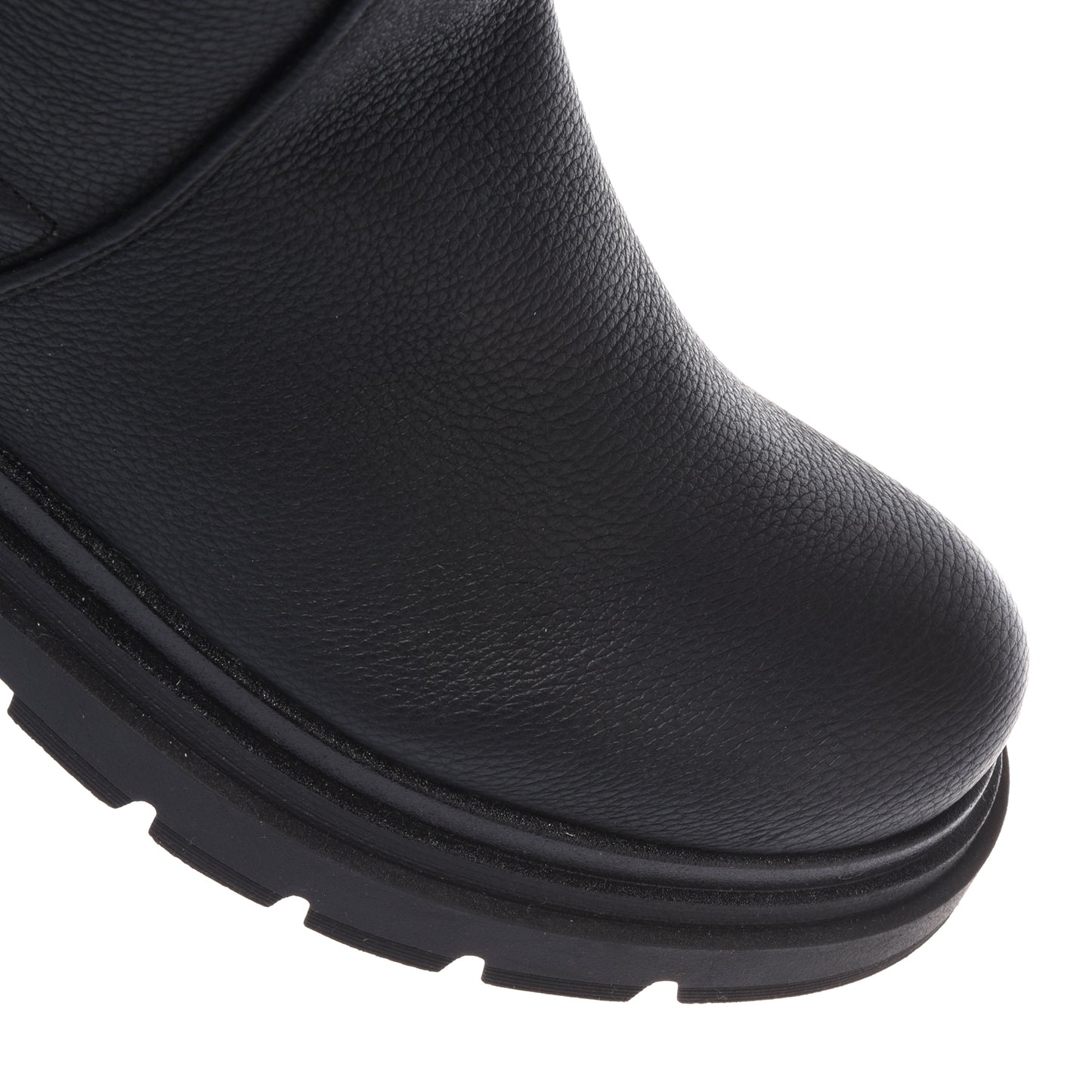 Black vegetable-tanned stretch leather boots