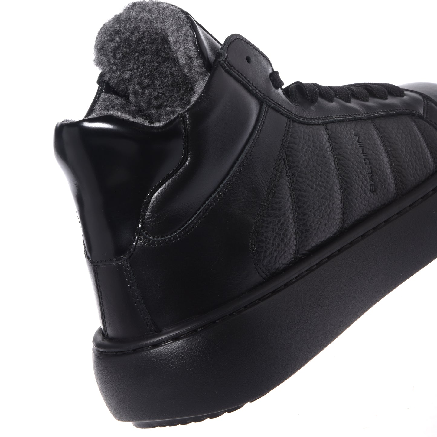 Black quilted leather sneakers