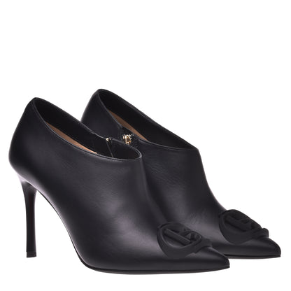 Bottes à talon en cuir de vachette noir