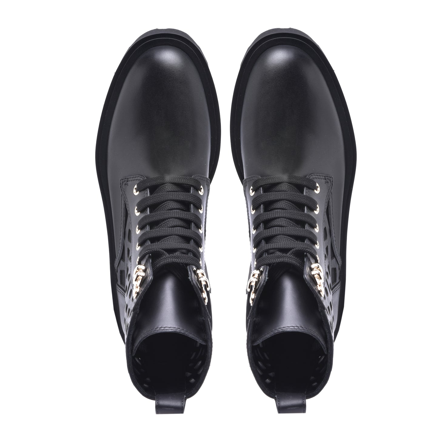 Combat boots in black laser-cut calfskin