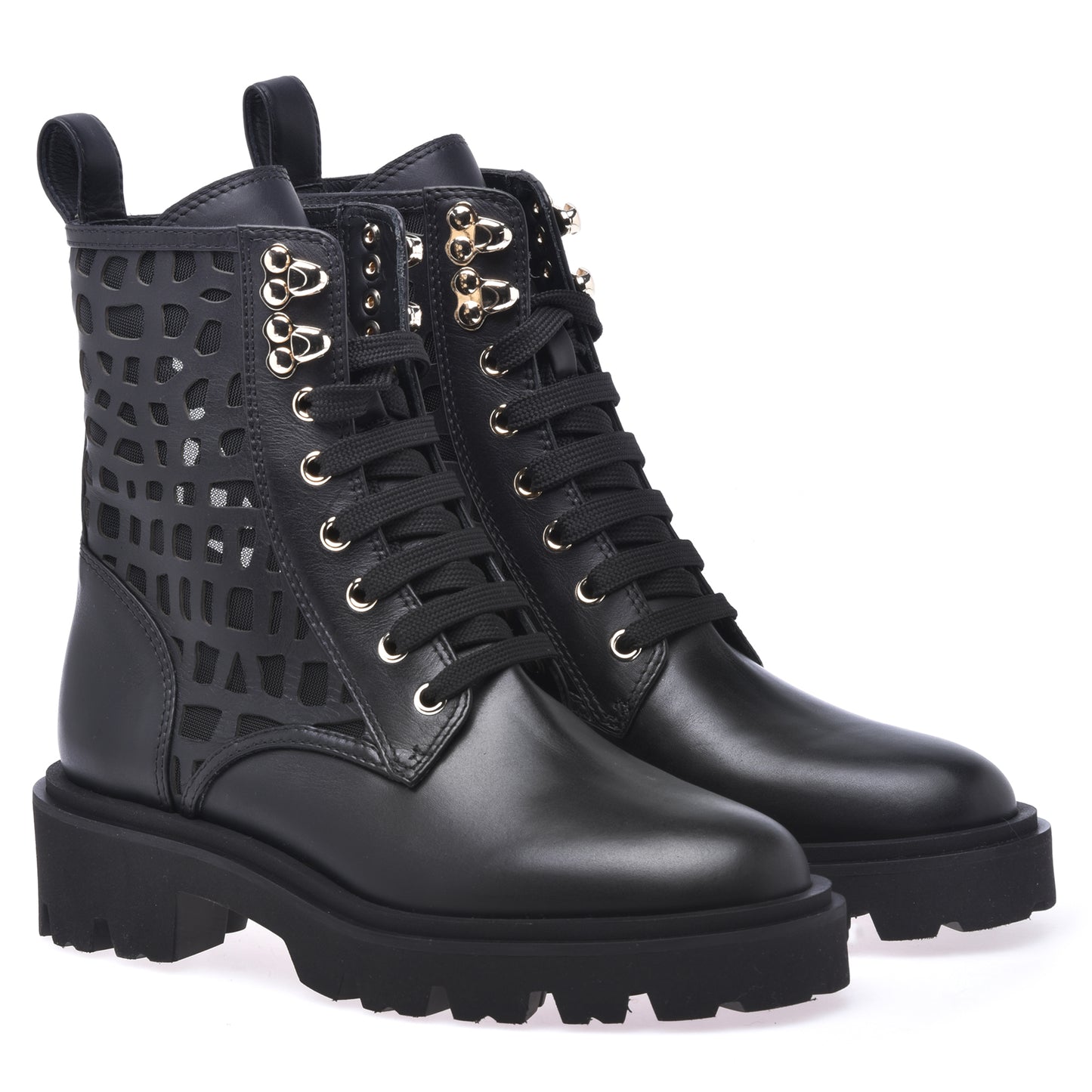 Combat boots in black laser-cut calfskin