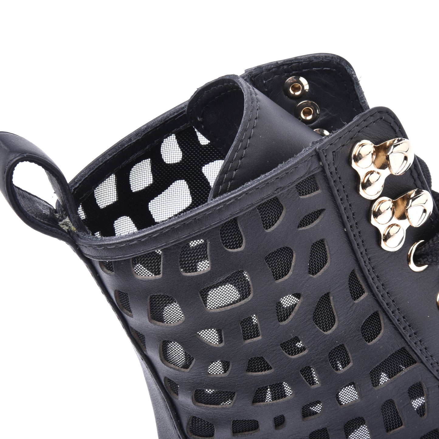 Combat boots in black laser-cut calfskin