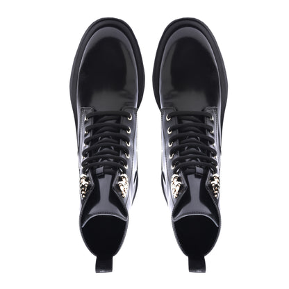 Combat boots in black calfskin