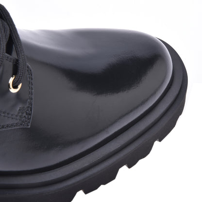 Combat boots in black calfskin