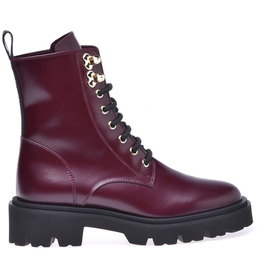 Combat boots in garnet red calfskin
