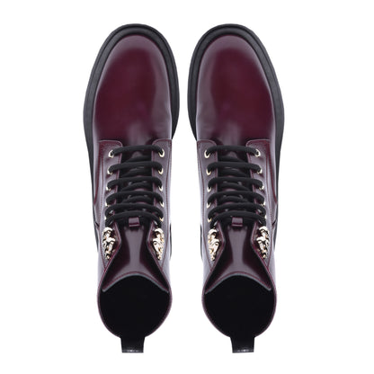 Combat boots in garnet red calfskin