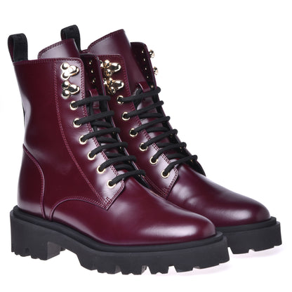 Combat boots in garnet red calfskin