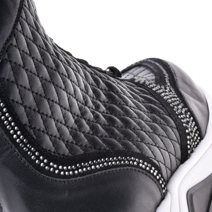 Sneakers montantes en nappa noir matelassé