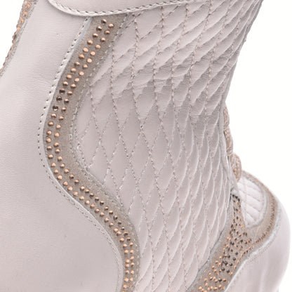 Sneakers montantes en nappa crème matelassé