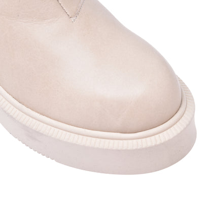 Ankle boots in off white cow hide
