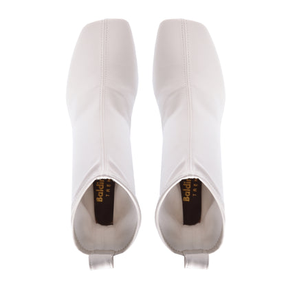 Stretchy ankle boots in ivory