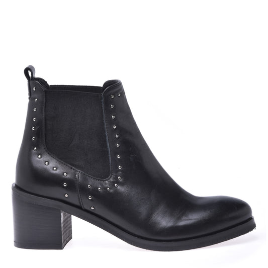 Ankle boots in black calfskin with studs