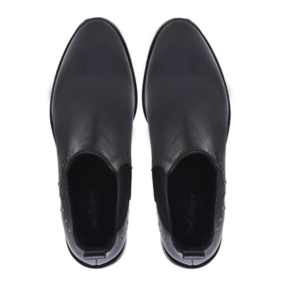 Ankle boots in black calfskin with studs