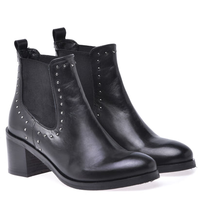 Ankle boots in black calfskin with studs