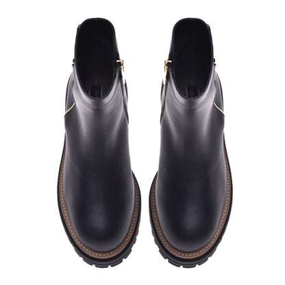 Black and platinum calfskin ankle boots