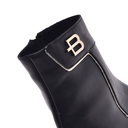 Black and platinum calfskin ankle boots