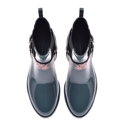 Rubber ankle boot with green leather inserts