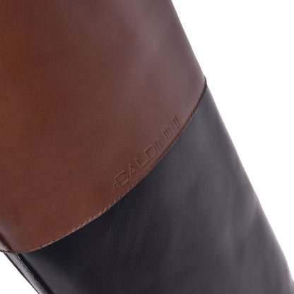 Black and tan calfskin boots