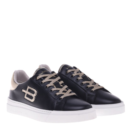 Sneakers noir et or en cuir de veau