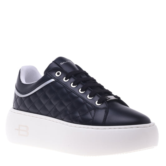 Sneakers noires en cuir matelassé