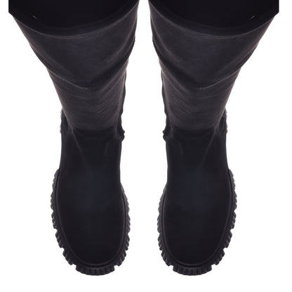 Boots in black eco-leather and suede