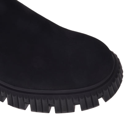 Boots in black eco-leather and suede