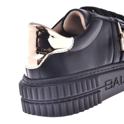 Baskets en cuir noir et cuir lamé doré