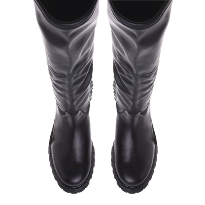 Bottes noires en simili cuir extensible