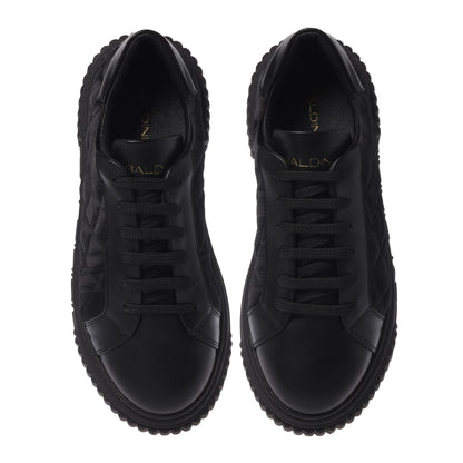 Sneaker en cuir noir et satin matelassé