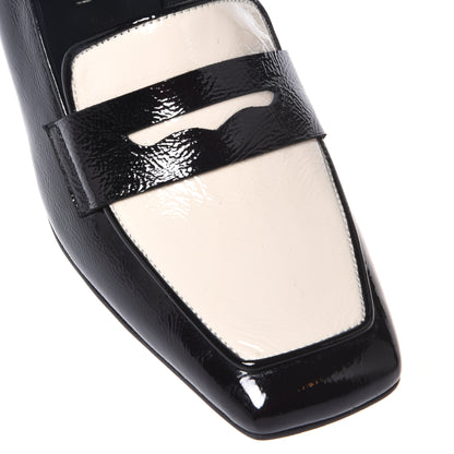 Black and white naplak heeled loafers