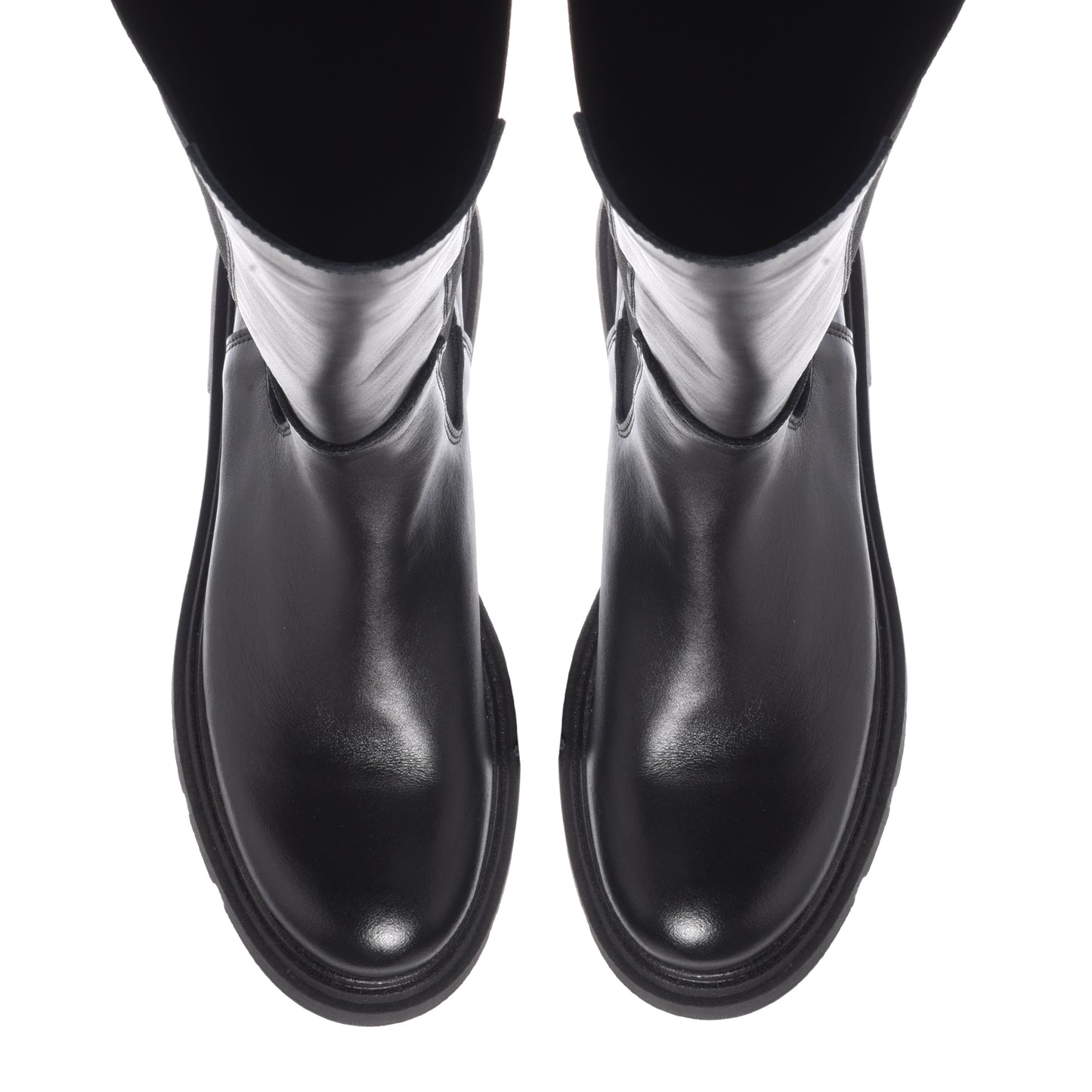 Black leather boots with elastic at the back