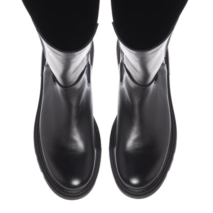 Black leather boots with elastic at the back
