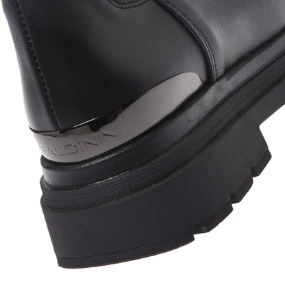 Black leather boots with elastic at the back