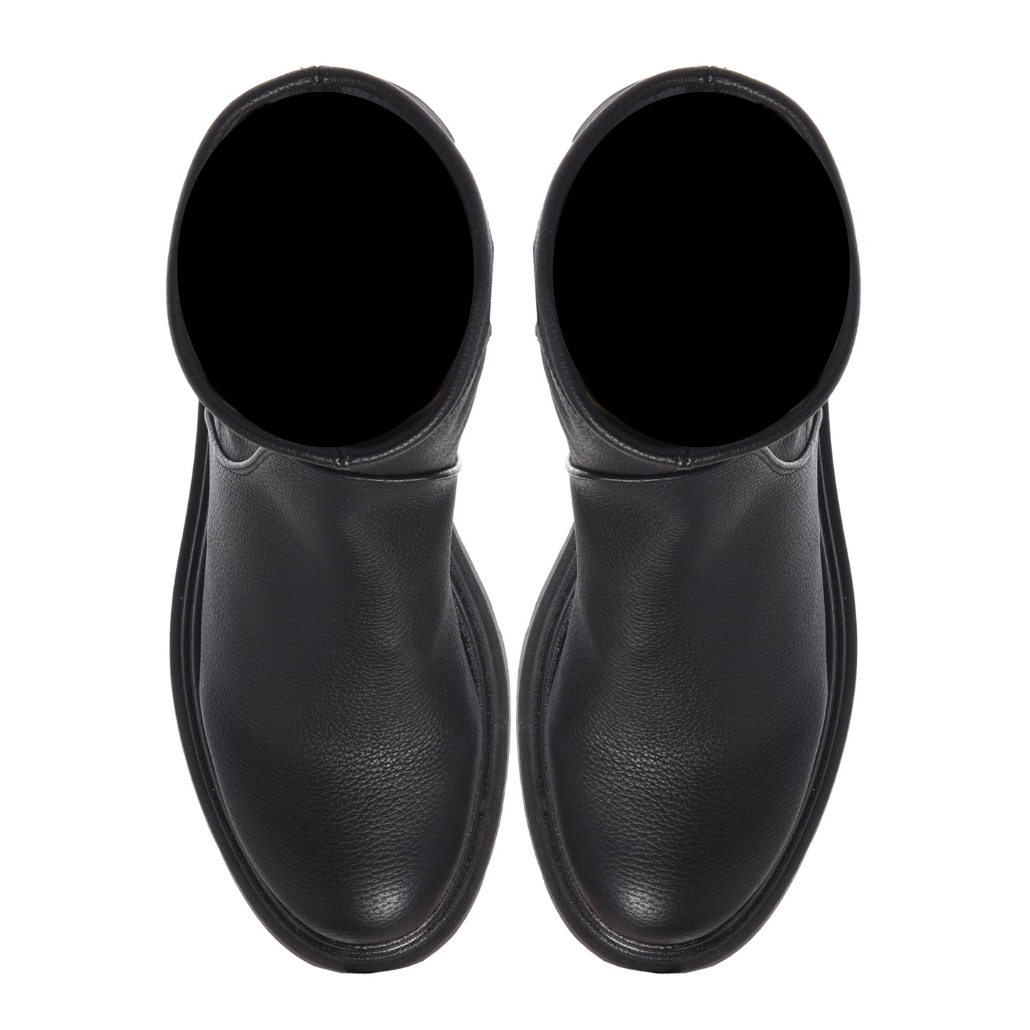 Black vegetable-tanned stretch leather boots