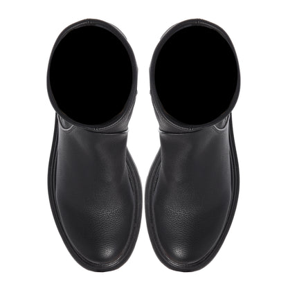 Black vegetable-tanned stretch leather boots