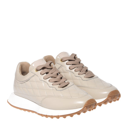 Nude quilted leather sneakers