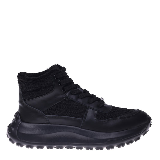 Sneaker in pelle nera e tessuto teddy nero