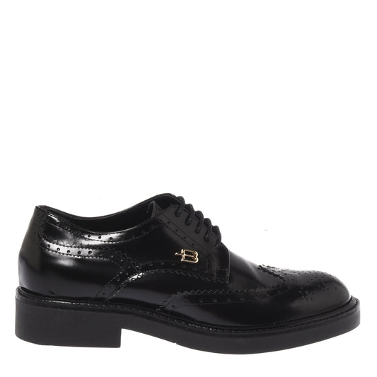 Black lace-up shoes in polished leather