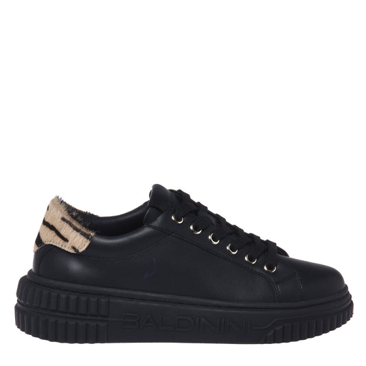Black leather sneakers with a pony hair effect