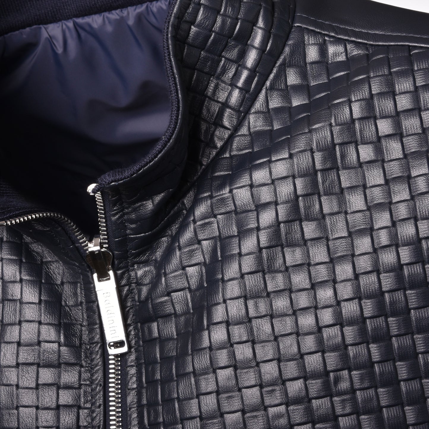 Veste réversible en cuir tressé et nylon bleu marine