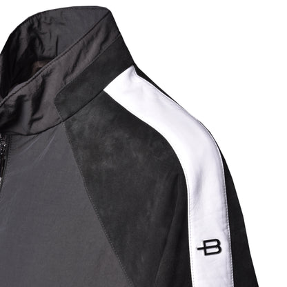 Veste vert foncé en tissu et daim