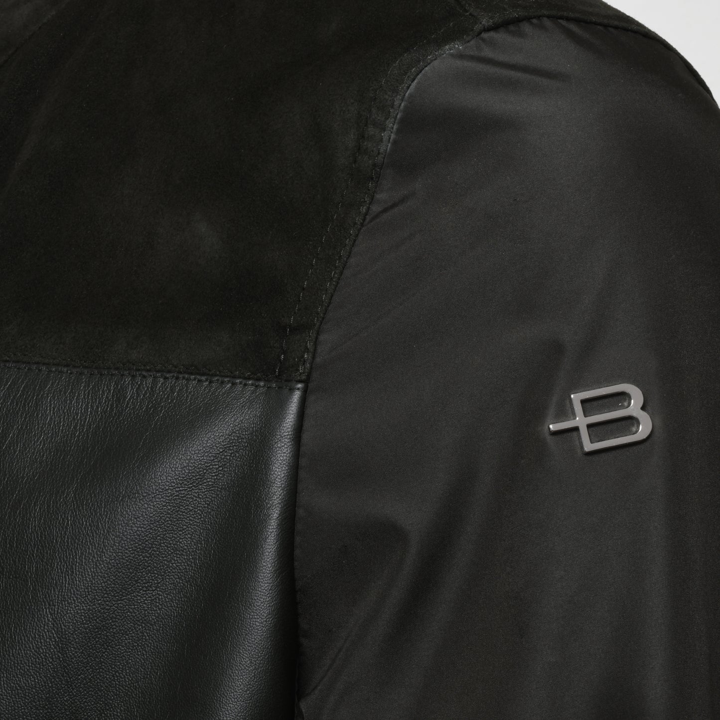 Veste vert foncé en tissu et daim
