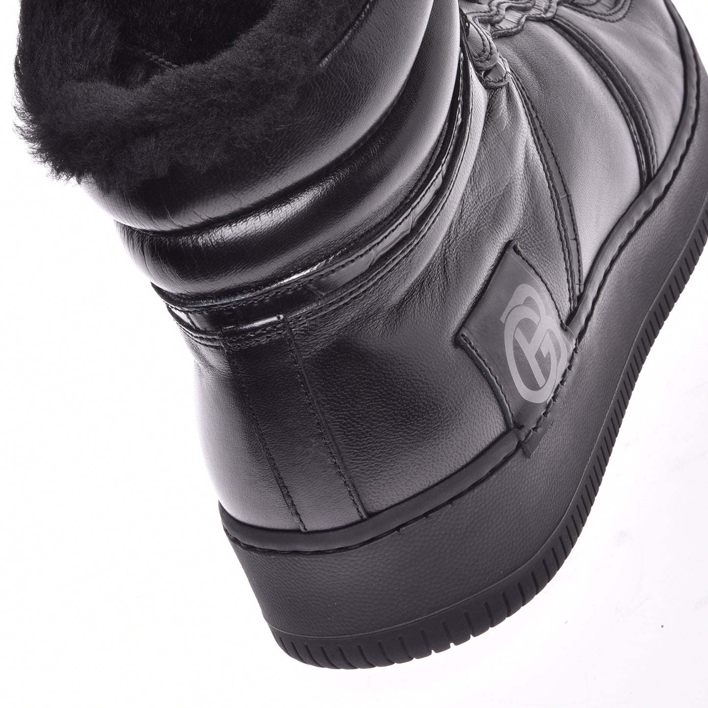 Sneakers montantes en cuir noir