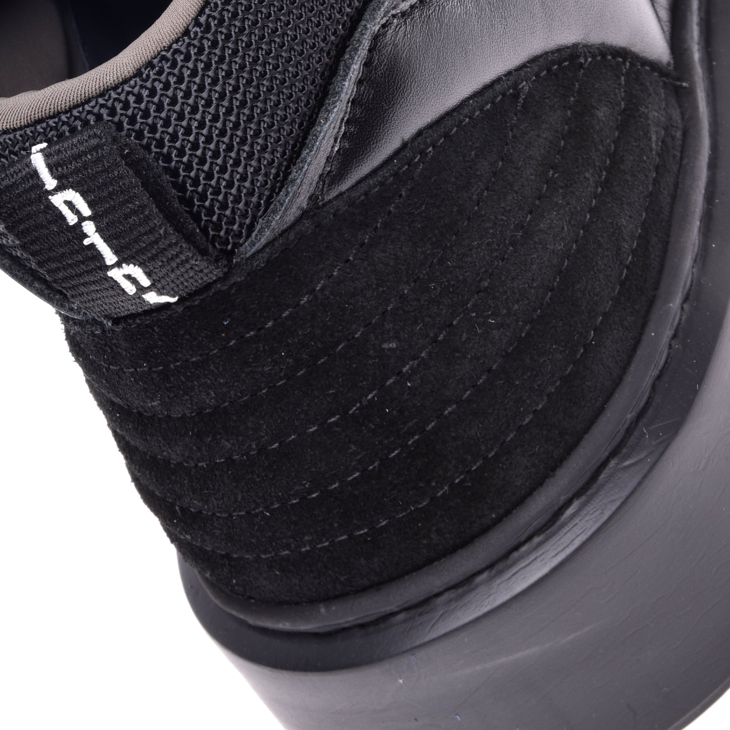 Sneakers montantes en nappa et suède noir