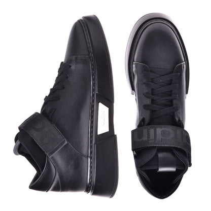 Sneakers montantes en cuir noir