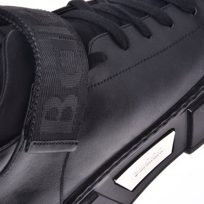 Sneakers montantes en cuir noir