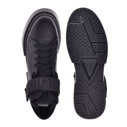 Sneakers montantes en cuir noir