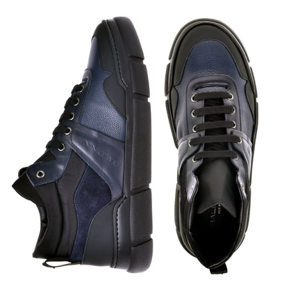Sneakers montantes en cuir bleu marine et tissu noir
