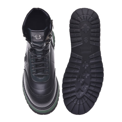 Ankle boots in military green and black calfskin and fabric